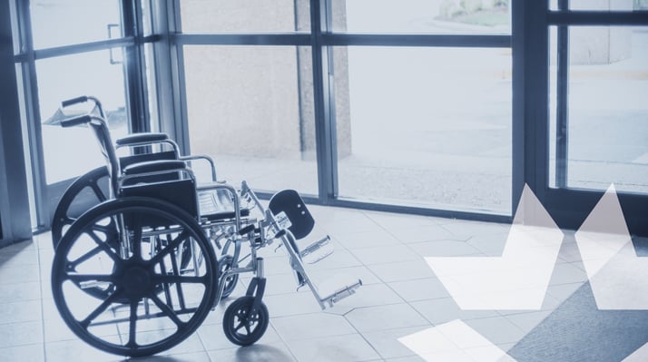 wheelchair by door to show the door hardware is ADA complaint