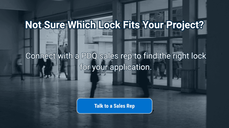 Commercial glass entrance doors with CTA button to talk to a PDQ sales rep about lock selection